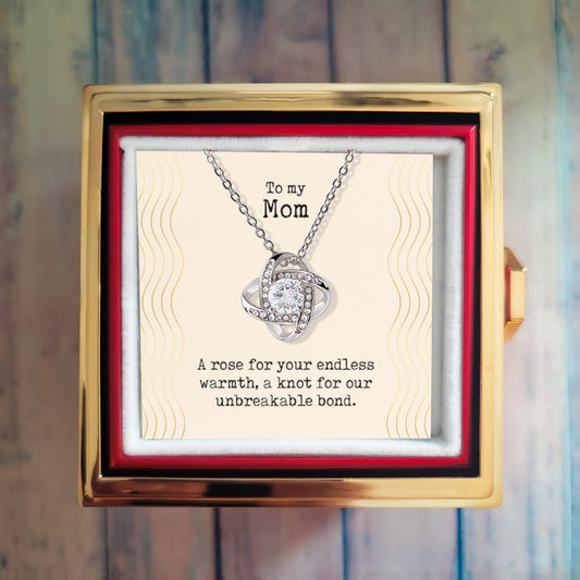 To My Mom Love Knot Necklace with Rotating Preserved Rose Gift Box Signifying an Unbreakable Bond
